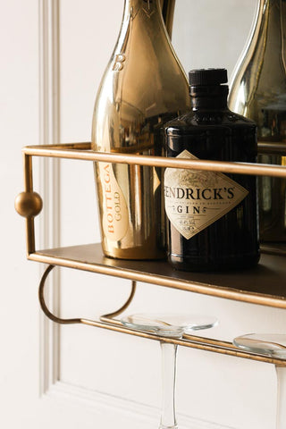Image of the shelf for the Gold Wall Mirror With Bar Shelf
