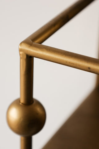 Image of the metal for the Gold Wall Mirror With Bar Shelf