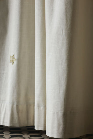Image of the material for the Set of 2 Cream Curtains with Gold Embroidered Stars
