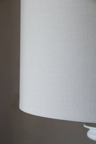 Close-up image of the linen lamp shade with the White Turned Wood Table Lamp