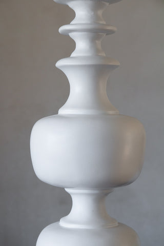 Close-up image of the White Turned Wood Table Lamp With Linen Lamp Shade