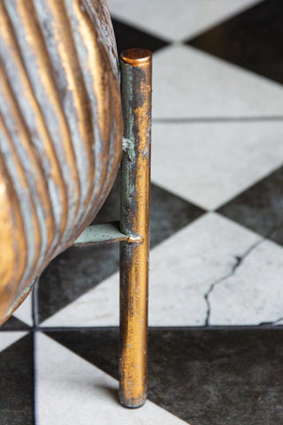 Close-up image of the legs on the Wide Gold Scallop Planter On Stand