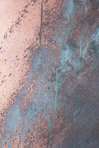 Close up image of a sample of copper effect paint. 