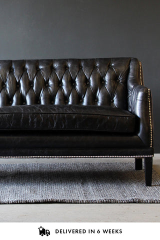 Lifestyle image of Black Leather Chesterfield 3 Seater Sofa