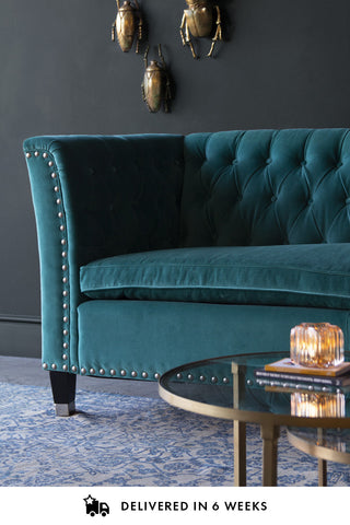 Lifestyle image of the right end of the Teal Velvet Chesterfield 3 Seater Sofa With Stud Detail
