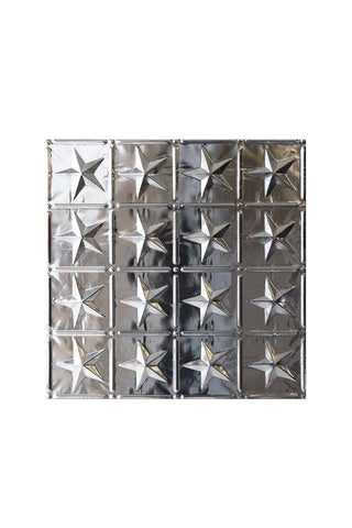 Image of a decorative tin tile with grid and star shapes on a plain white background. 