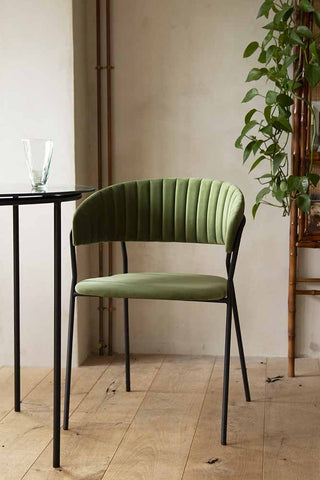 Lifestyle image image front on of the Curved Back Velvet Dining Chair In Moss Green
