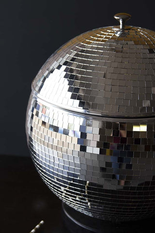 A large disco ball that has a lid that is removable. The base becomes a dinks sharer that is suitable for 6-8 people .