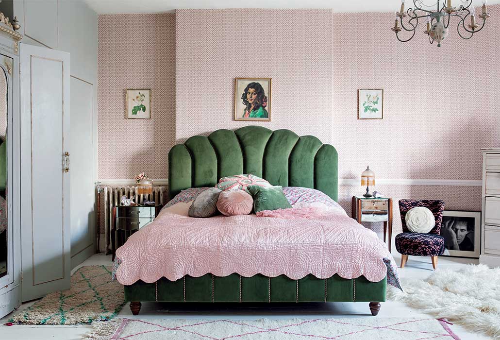 bedroom with green velvet bed