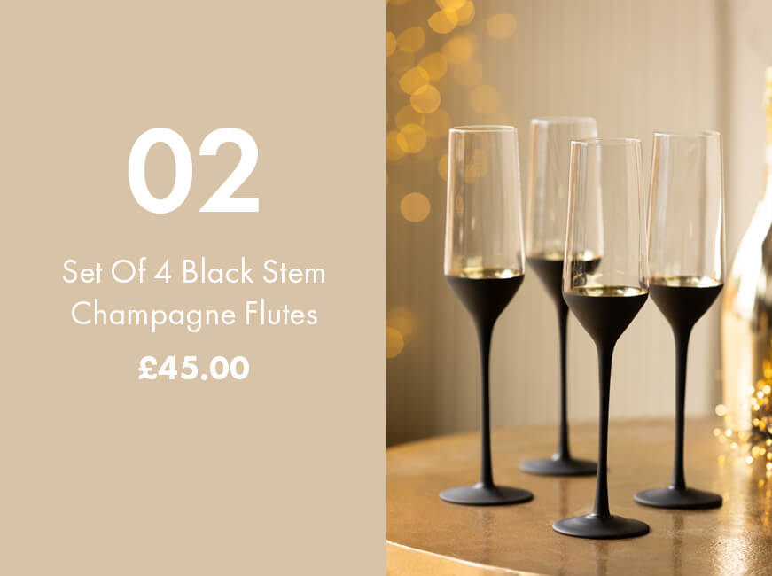 image of black and gold champagne flutes 